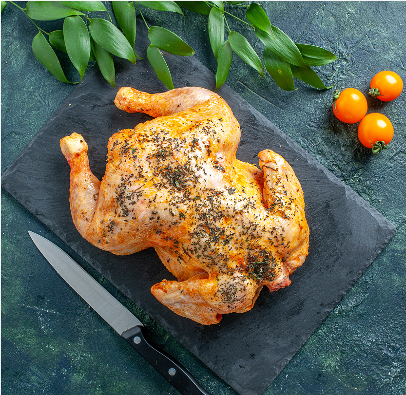 raw-fresh-chicken-feets-wooden-plate